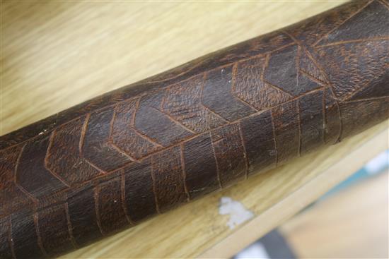 A paperwork didgeridoo